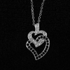 Costume jewelry double heart necklace